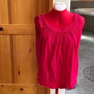 Pink sleeveless blouse